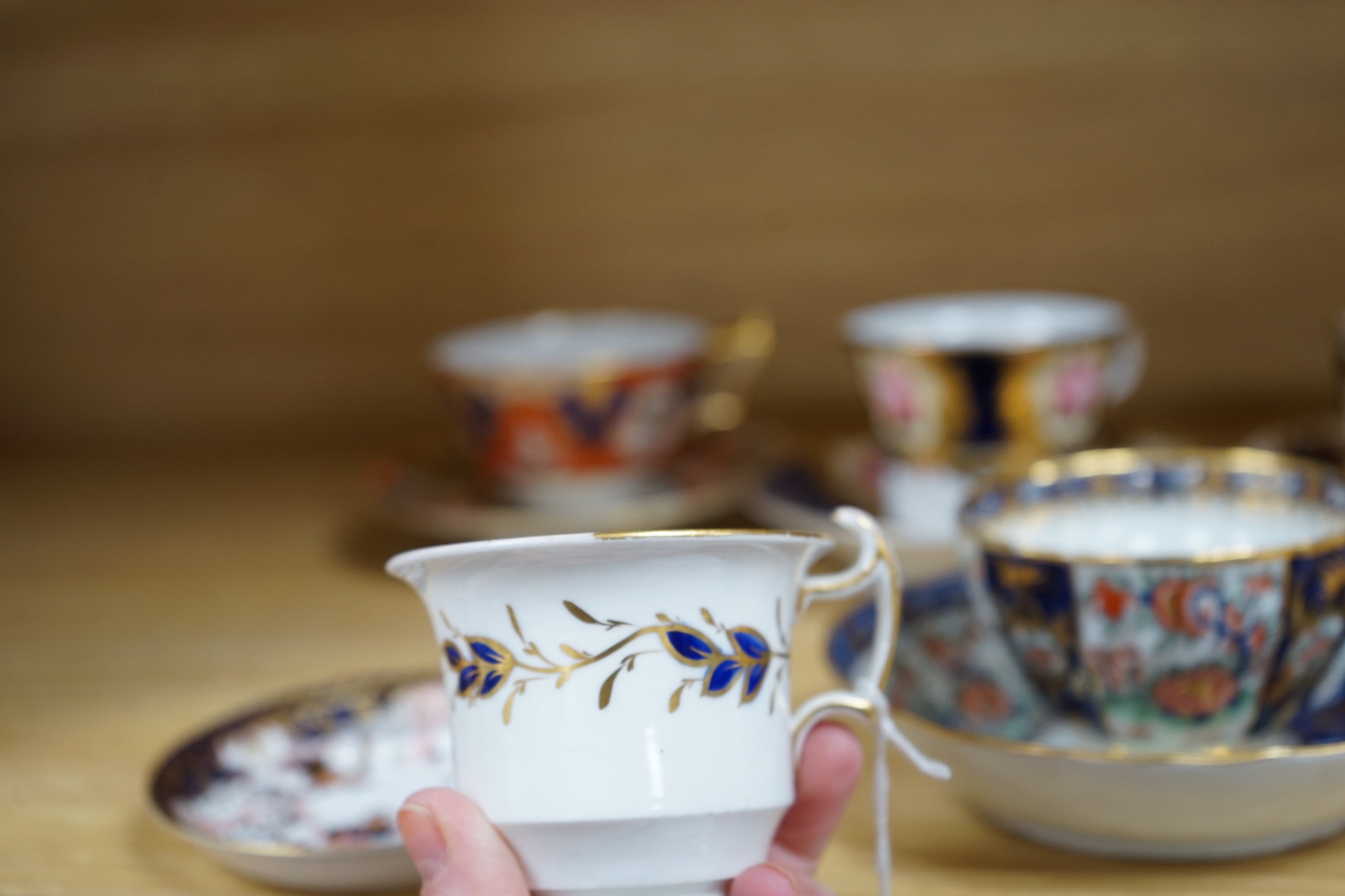 A selection of various English porcelain tea cups and saucers, to include Barr Flight Barr